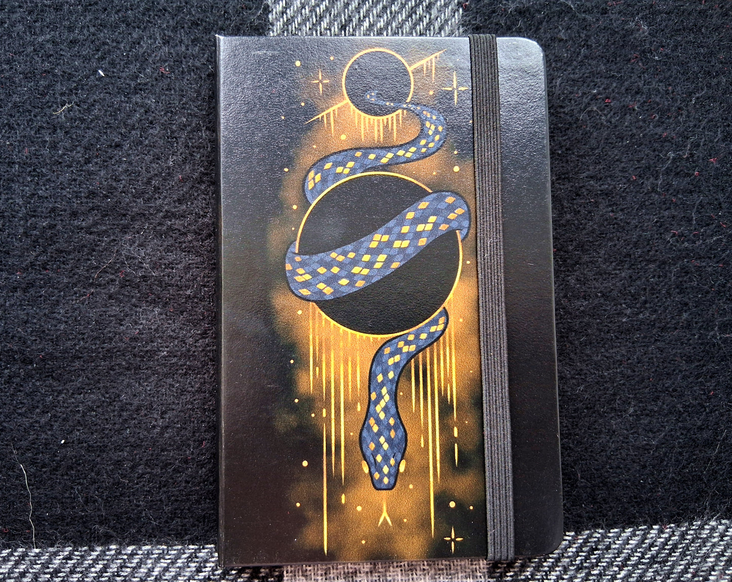 A6 Leatherette Dotted Notebook with Cosmic Snake Design